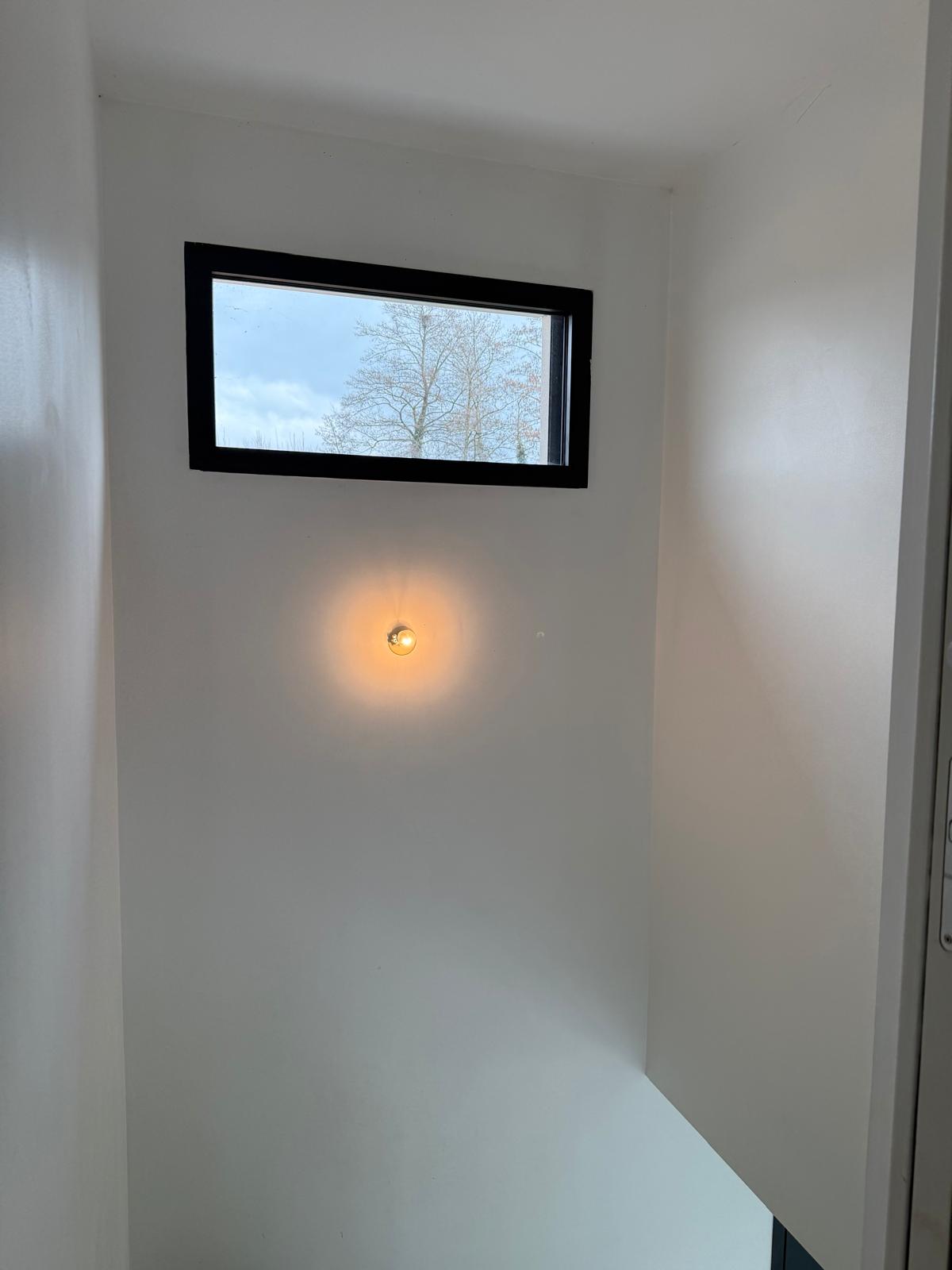 Vue sur une fenêtre dans une maison à Septème